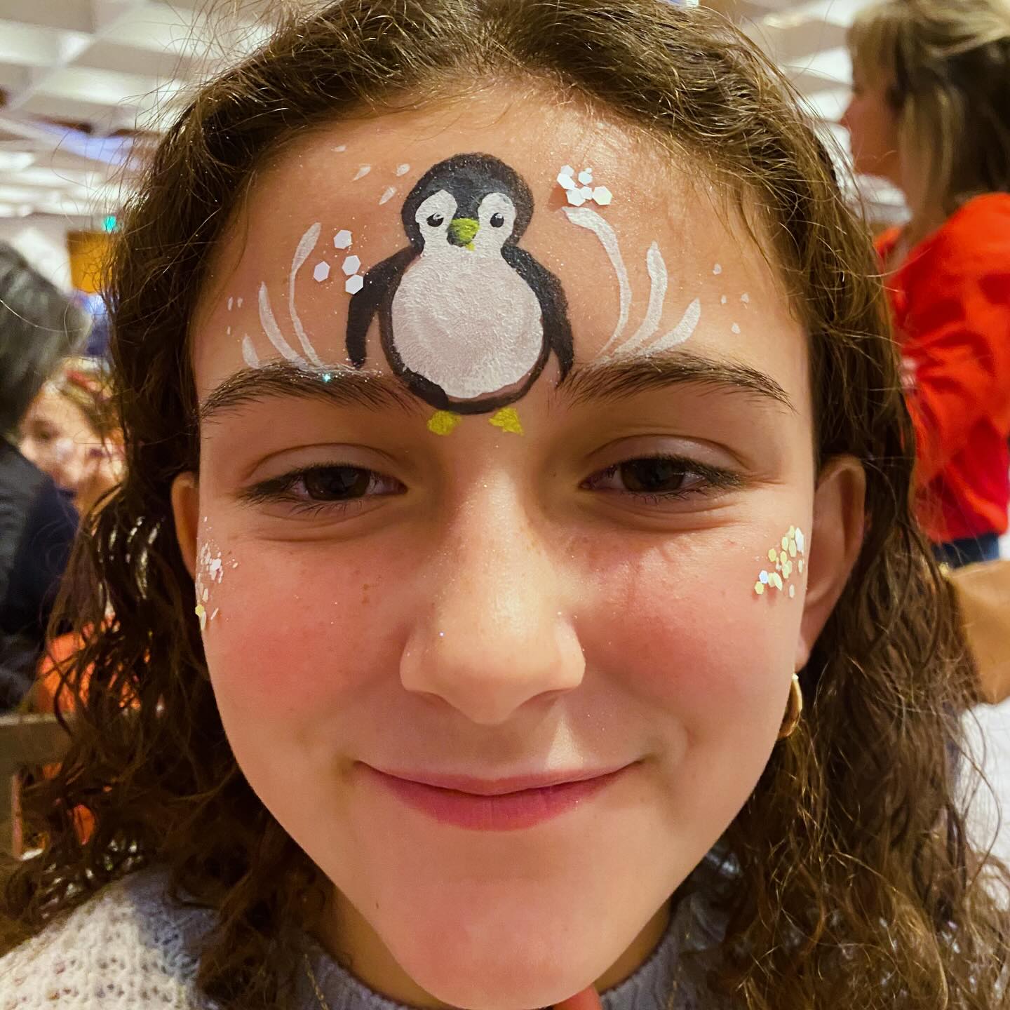 Face painting by Sparkle Motion