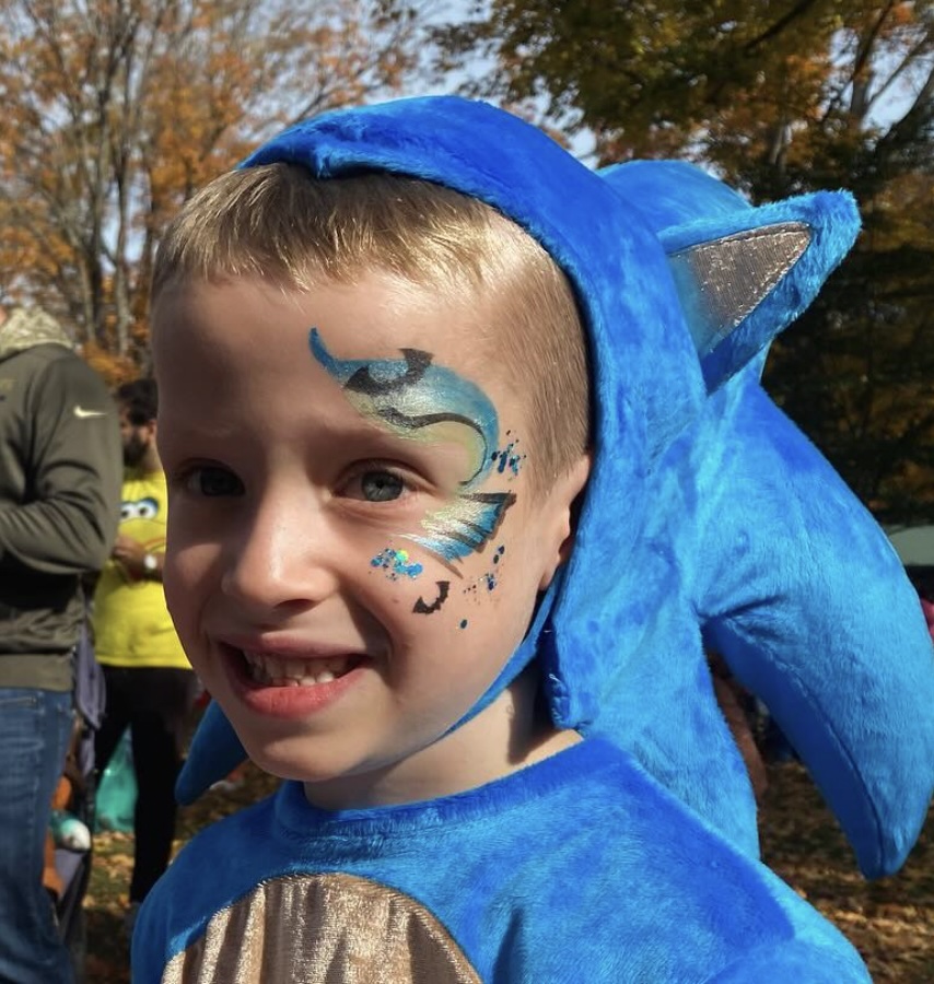 Face painting by Sparkle Motion