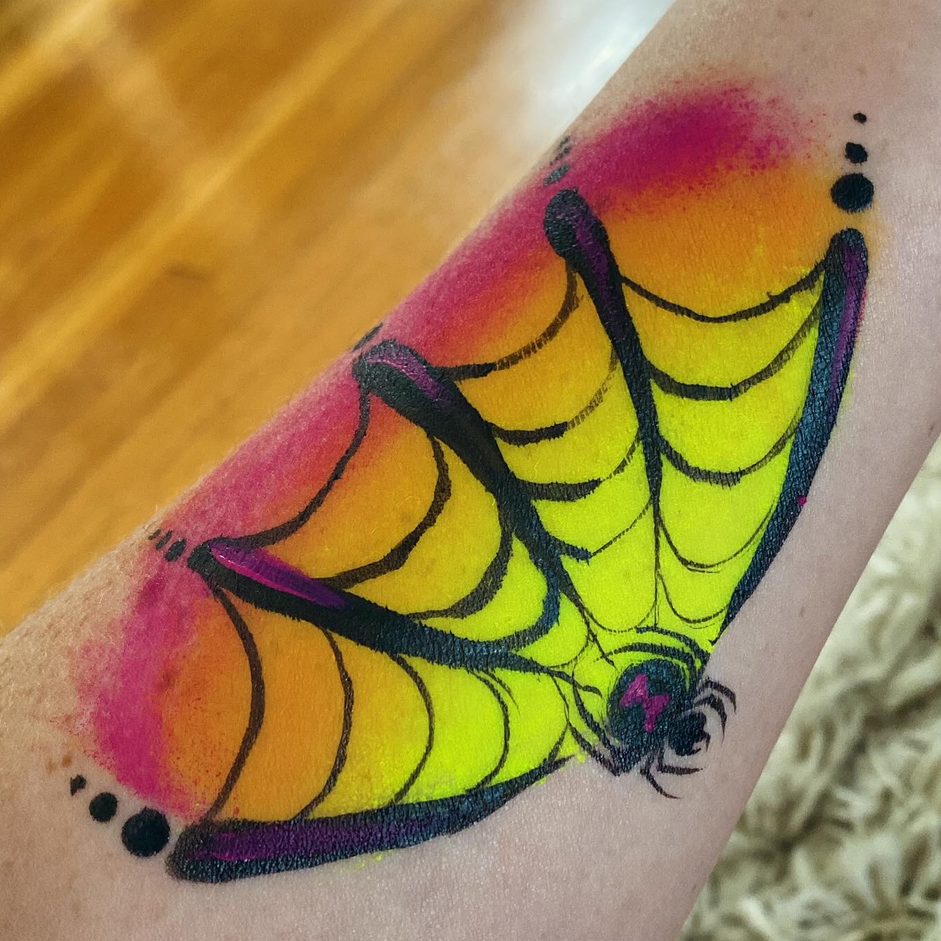 Face painting by Sparkle Motion